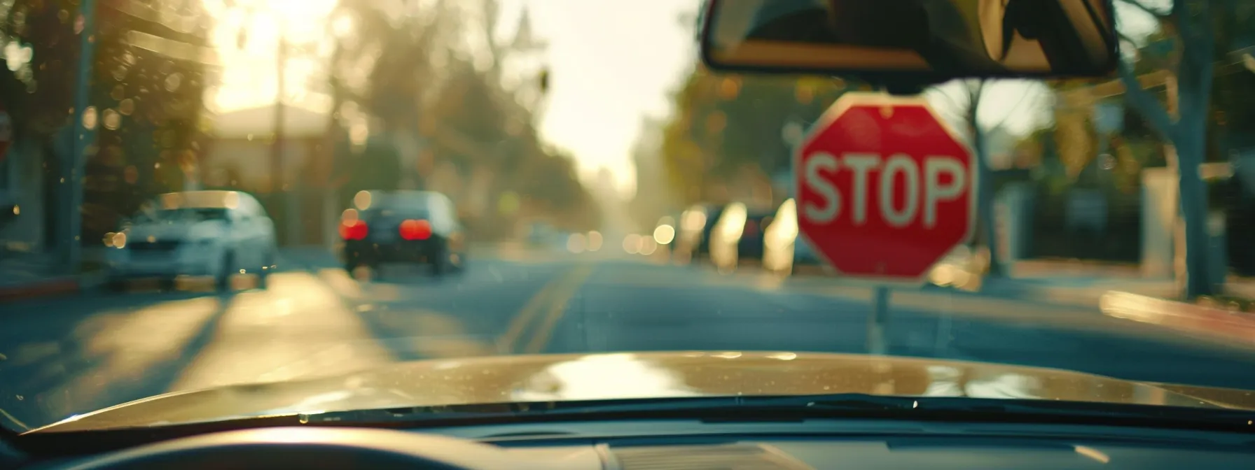 a driver driving past a stop sign during a driving test.